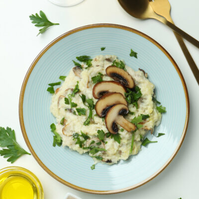 concept-tasty-food-with-risotto-with-mushrooms-white-background